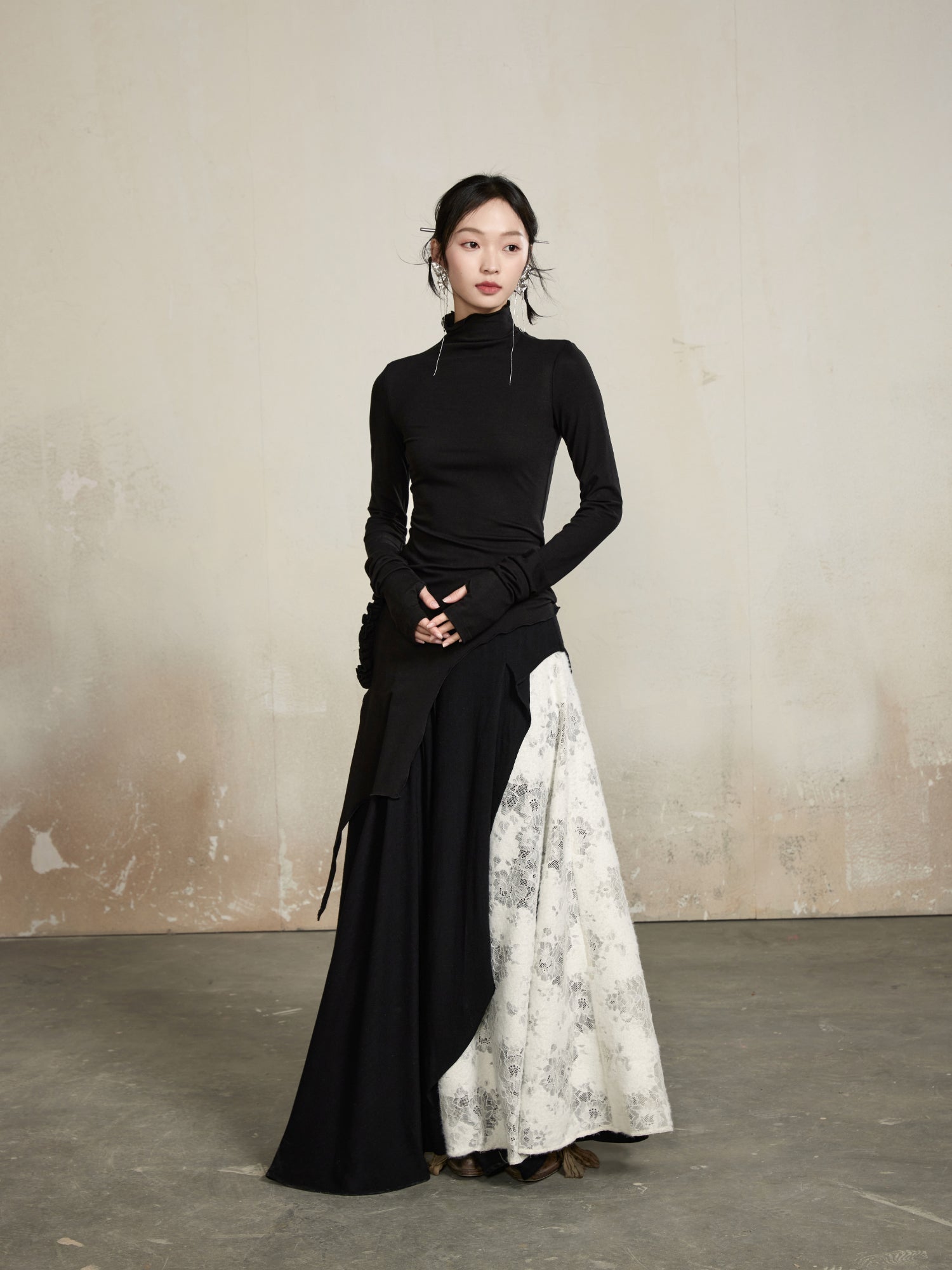 Coup de pouce haut à col haut élégant asymétrie