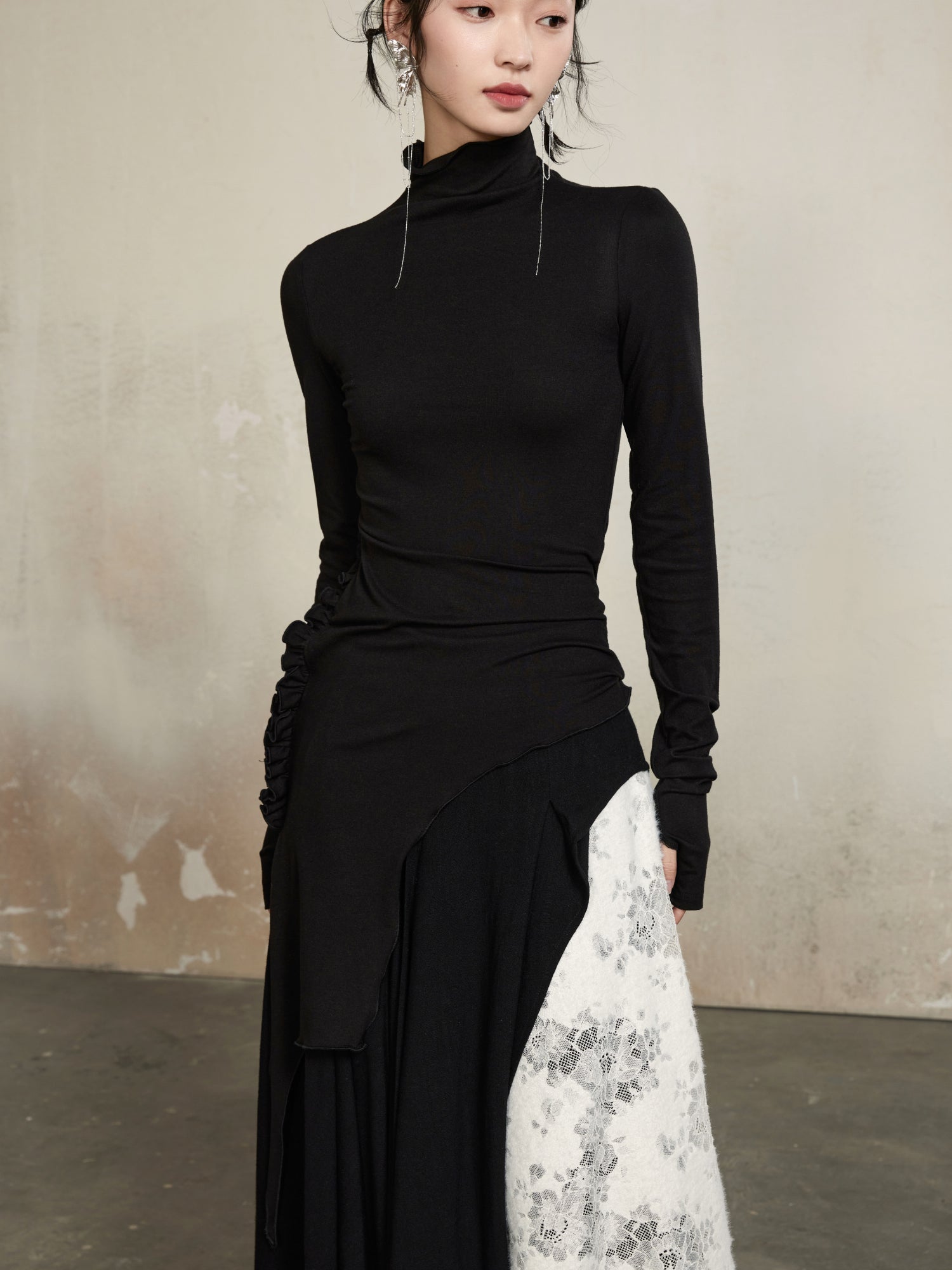 Coup de pouce haut à col haut élégant asymétrie