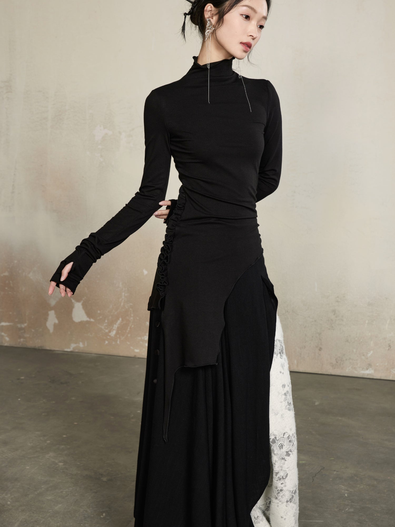 Coup de pouce haut à col haut élégant asymétrie