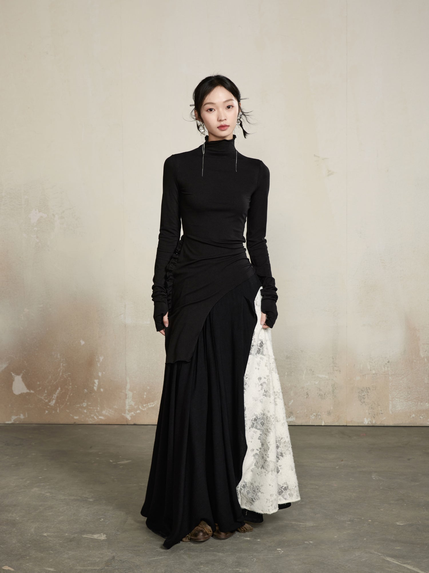 Coup de pouce haut à col haut élégant asymétrie