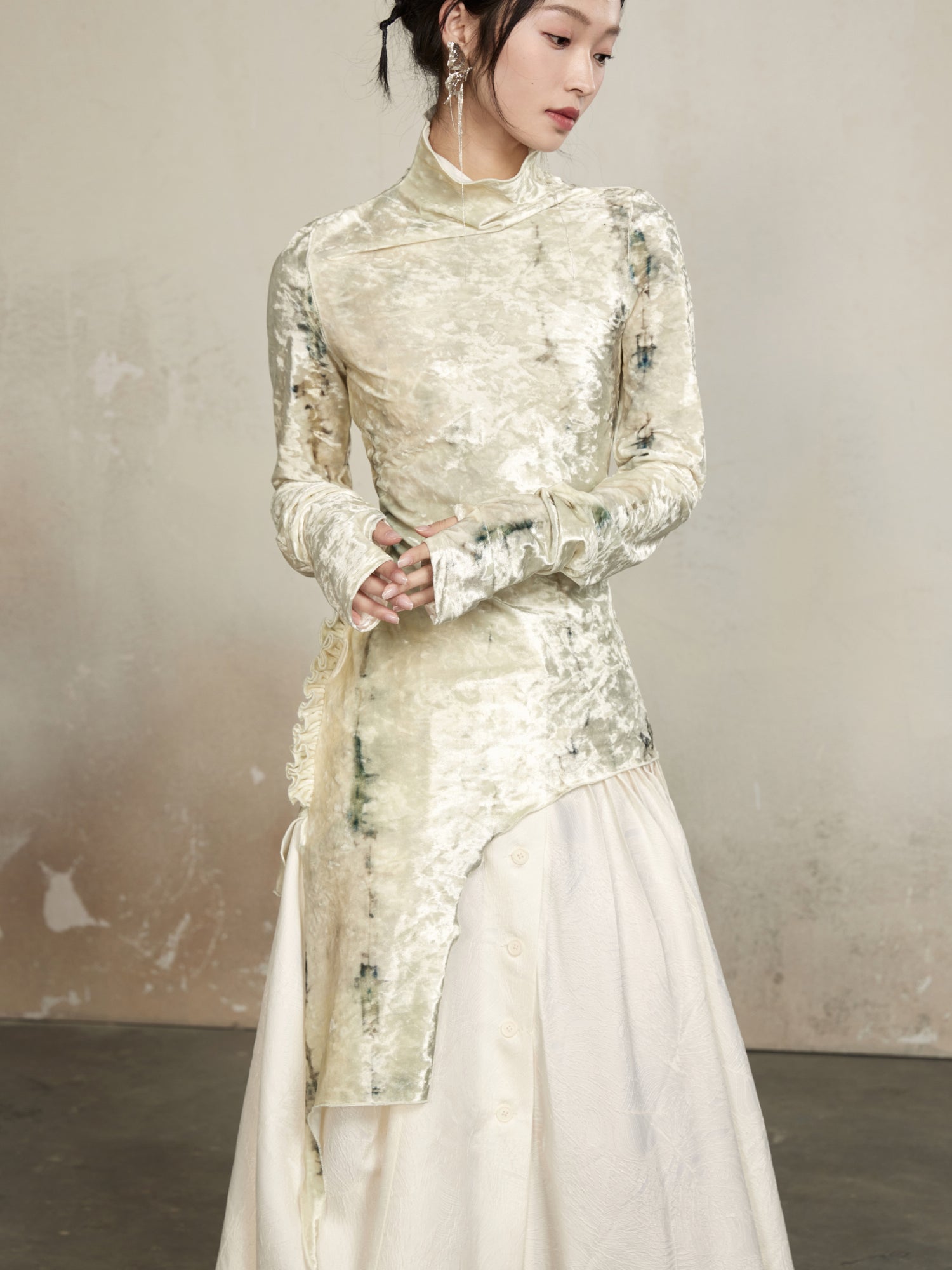 Coup de pouce haut à col haut élégant asymétrie