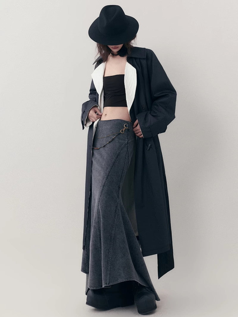 바이 컬러 니치 모노톤은 긴 코트를 주름지게했다