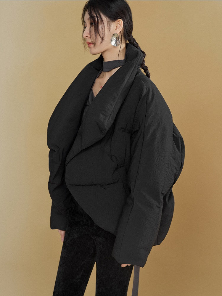 Gestapelte Knackpackung gebogen