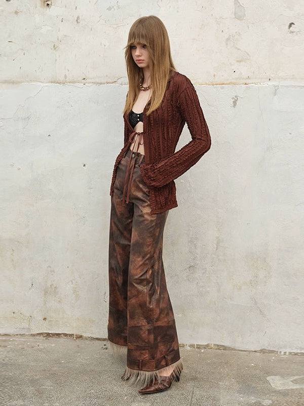 Pelz umgedreht verschmierte Lederhosen