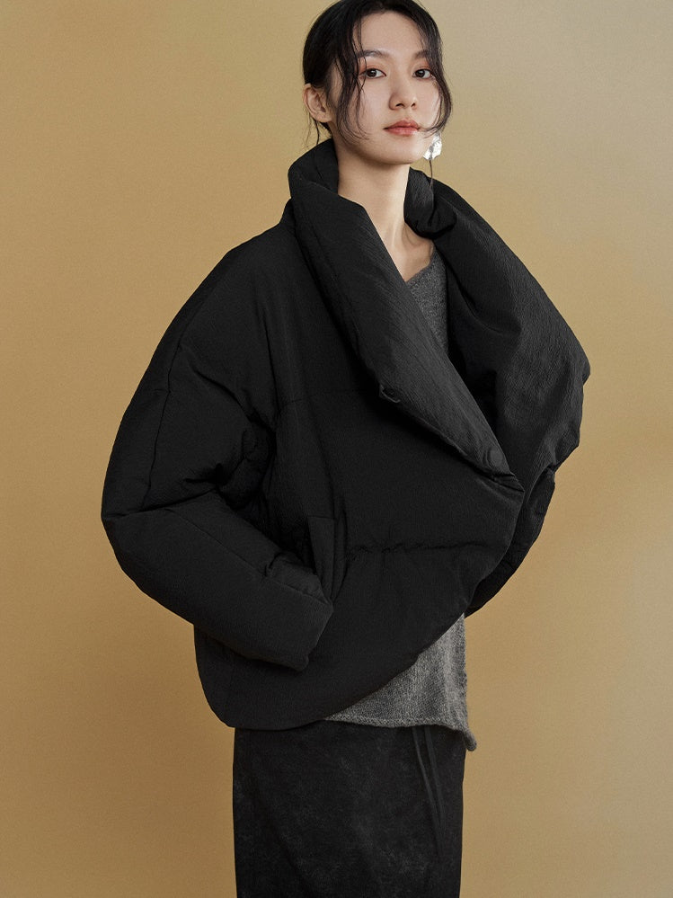 Gestapelte Knackpackung gebogen