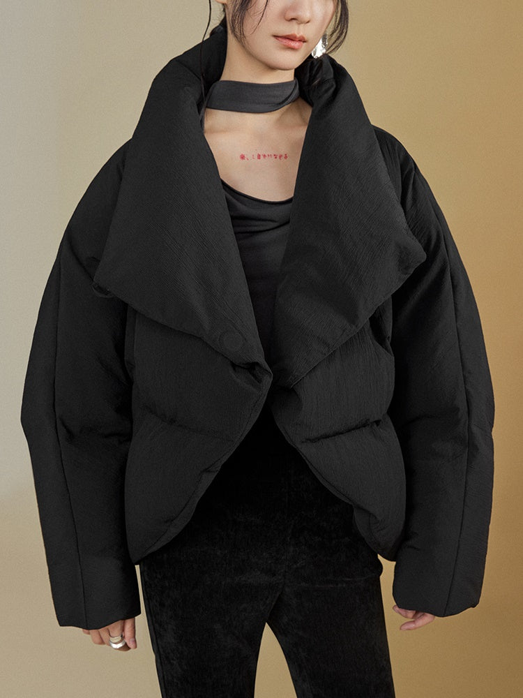 Gestapelte Knackpackung gebogen