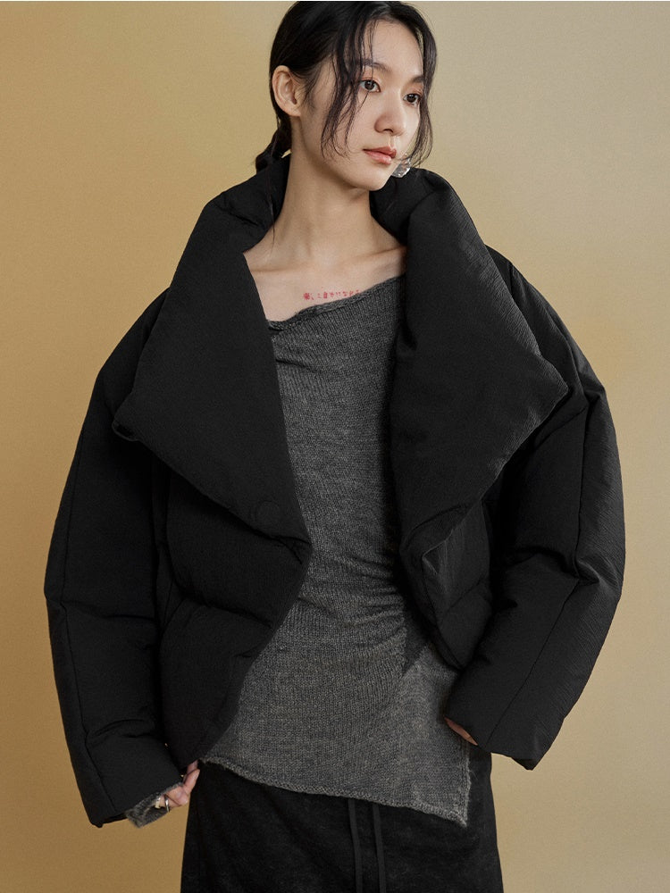 Gestapelte Knackpackung gebogen