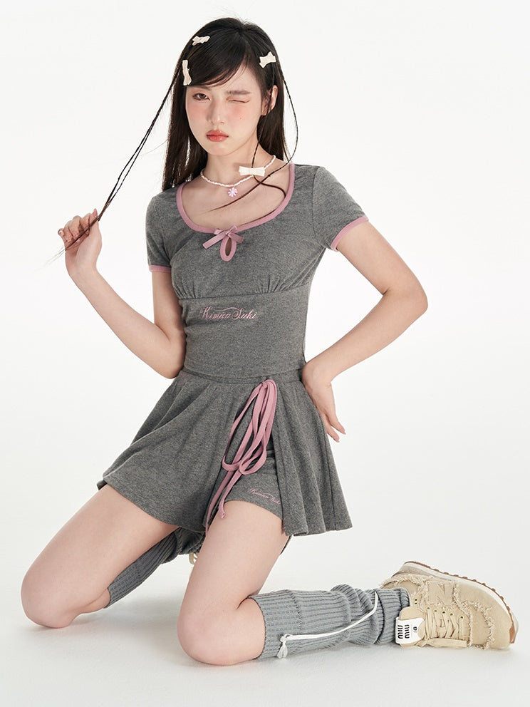 U-Neck-Druckbow-Top & Schlitzrockhose