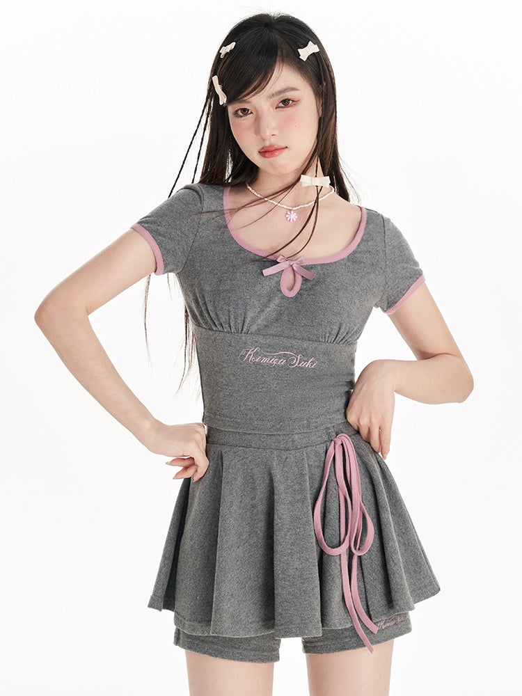 U-Neck-Druckbow-Top & Schlitzrockhose