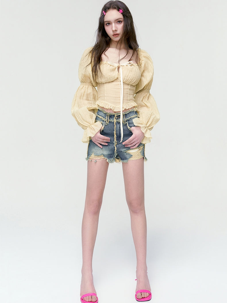 Vintage-Denim-Kurzherd-Heißhose beschädigen