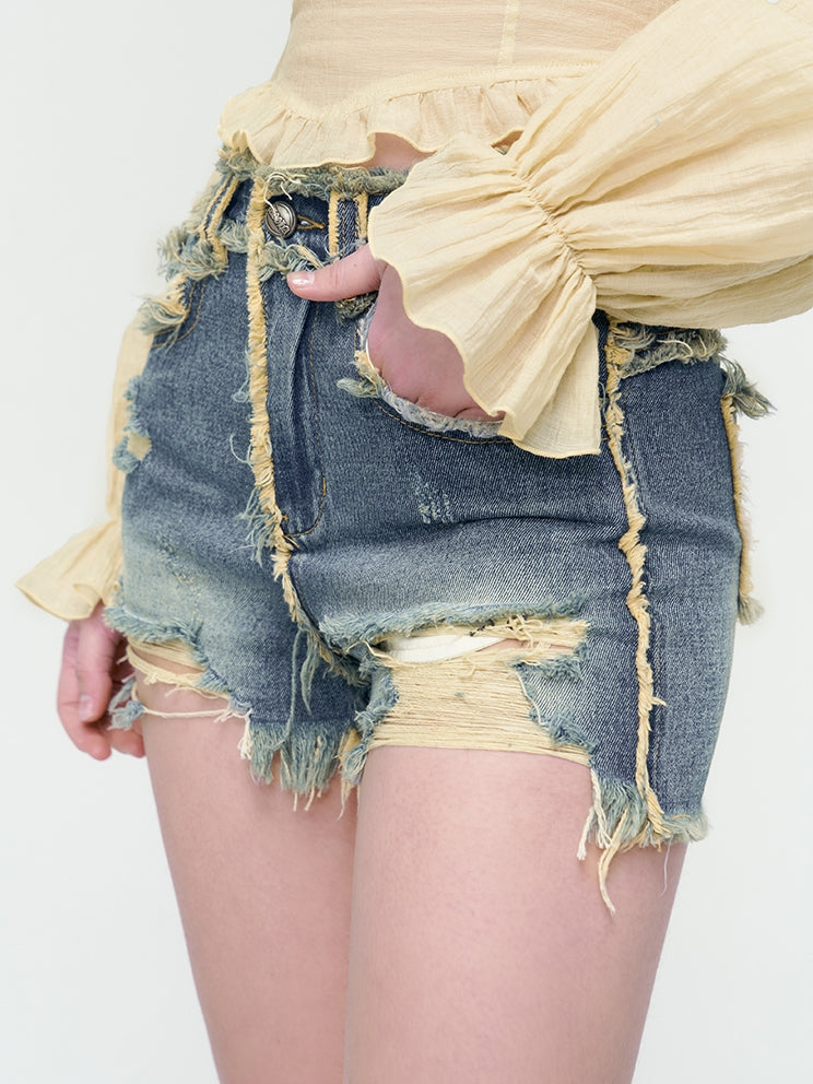 Vintage-Denim-Kurzherd-Heißhose beschädigen