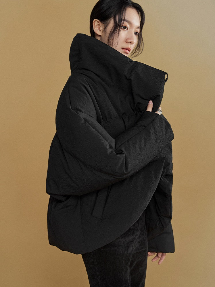 Gestapelte Knackpackung gebogen