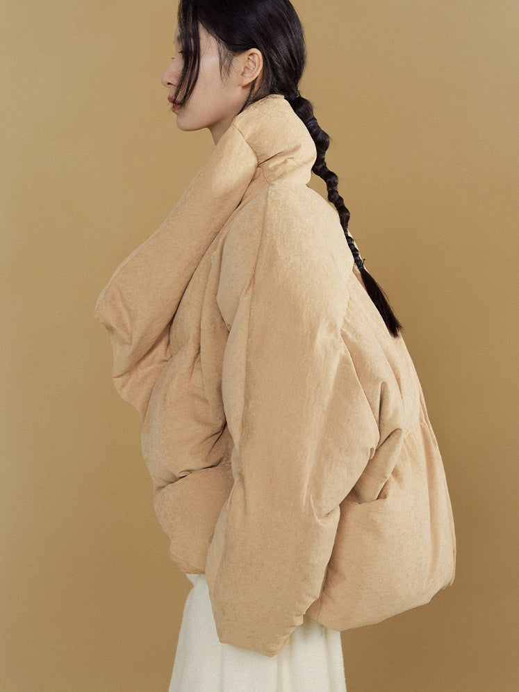 Gestapelte Knackpackung gebogen