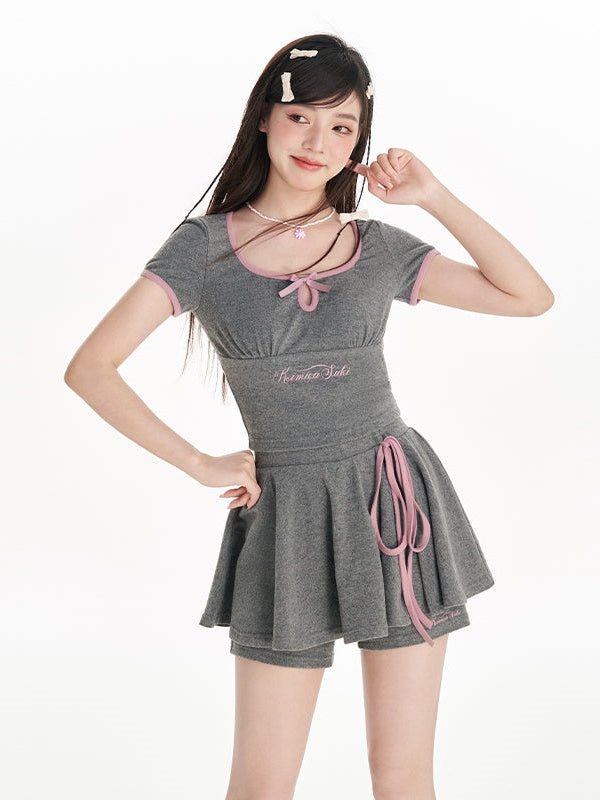 U-Neck-Druckbow-Top & Schlitzrockhose
