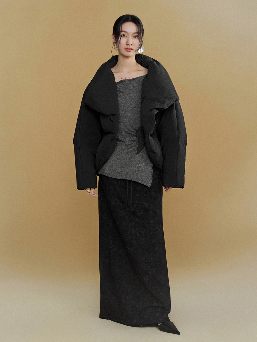 Gestapelte Knackpackung gebogen