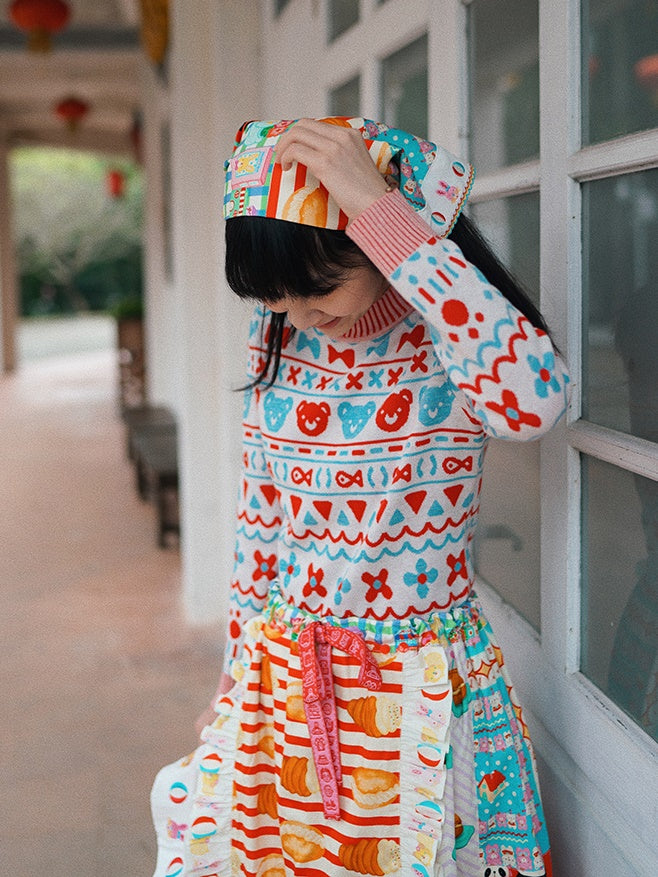 머리를 날씬한 니트 스웨터