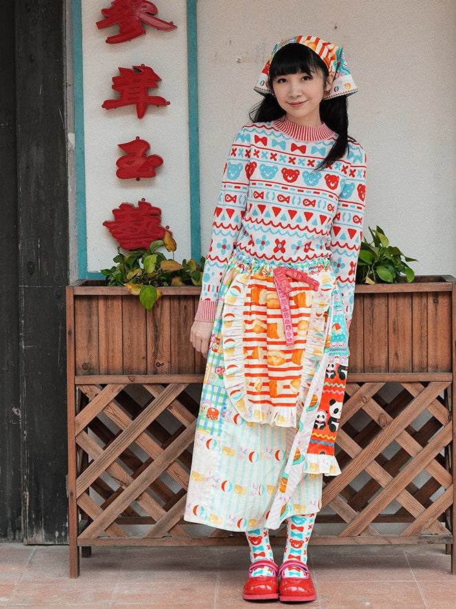 머리를 날씬한 니트 스웨터