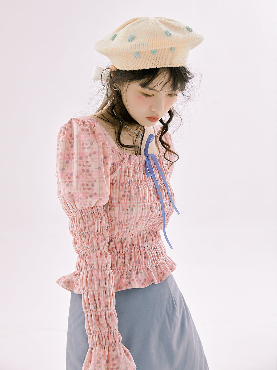 Falten Sie eine Bluse mit Schaufelschotter