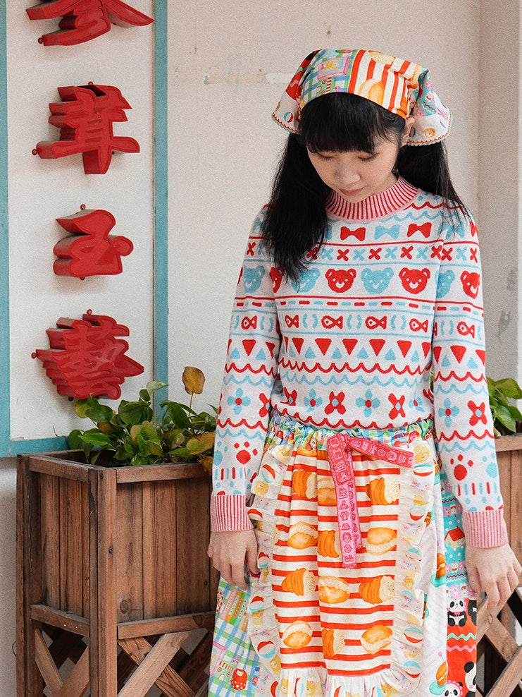 머리를 날씬한 니트 스웨터