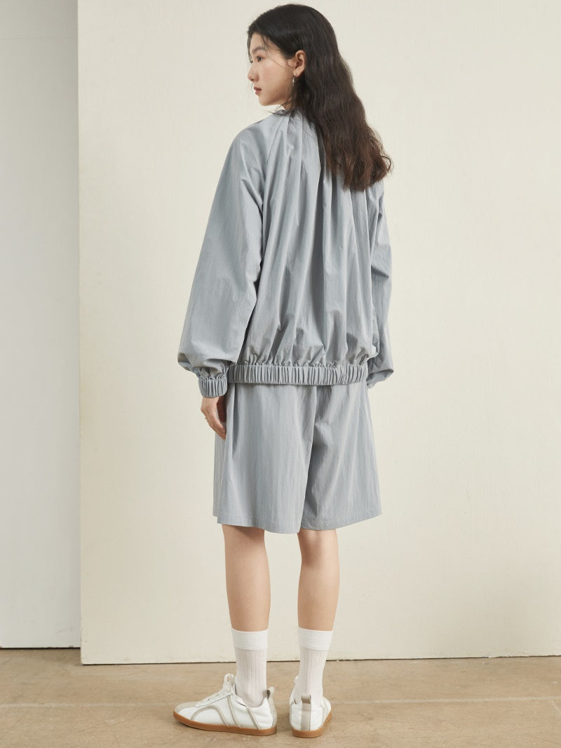 Draw String -Designjacke und kurze Hosen