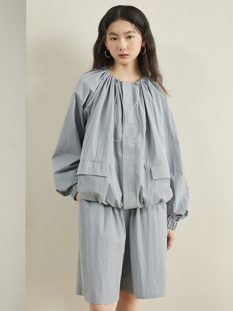 Draw String -Designjacke und kurze Hosen