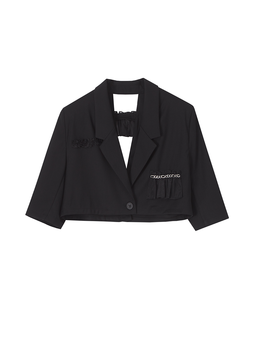 Veste courte à couteaux et shorts hauts à taille haute