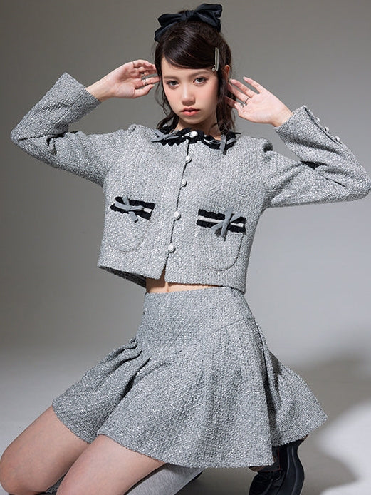 Kleine Duft -Bow -Strickjacke und Faltenrock