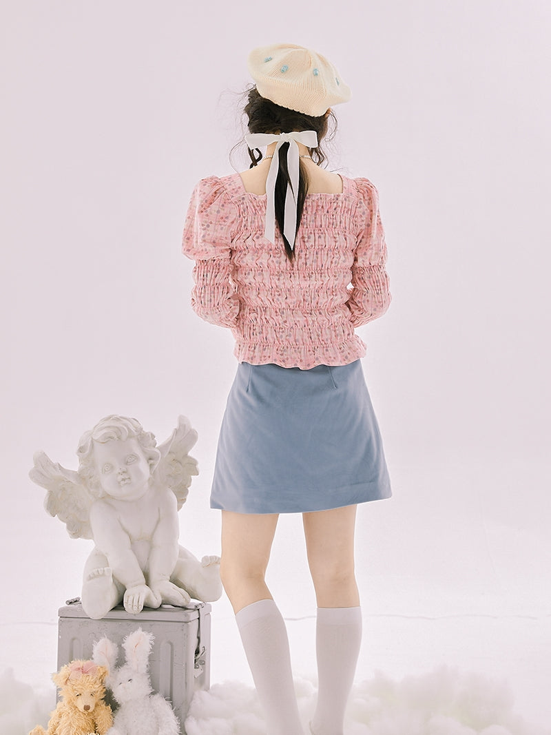 Falten Sie eine Bluse mit Schaufelschotter