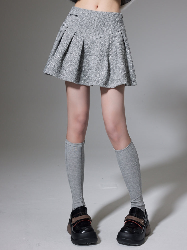 Kleine Duft -Bow -Strickjacke und Faltenrock