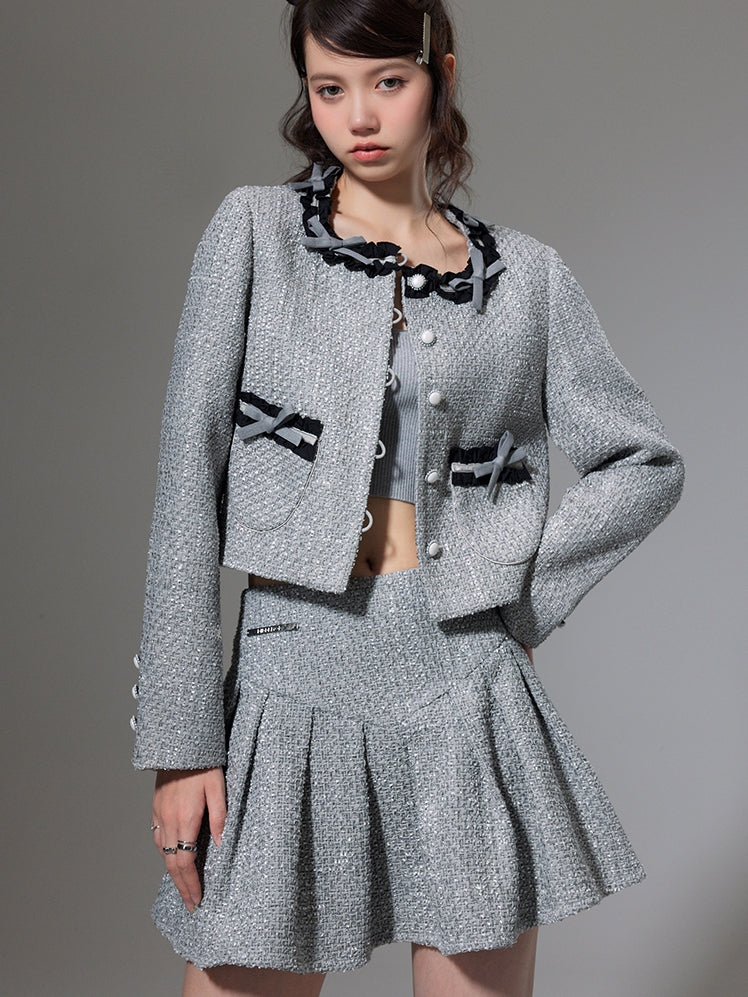 Kleine Duft -Bow -Strickjacke und Faltenrock