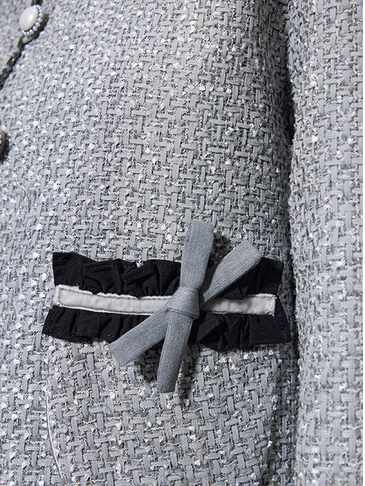 Kleine Duft -Bow -Strickjacke und Faltenrock