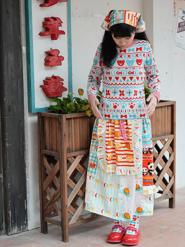 머리를 날씬한 니트 스웨터