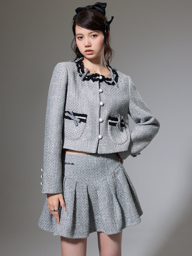Kleine Duft -Bow -Strickjacke und Faltenrock
