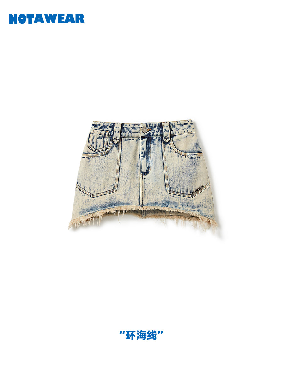 Tassel verblasste Denim-Asymmetrie-Mikro-Mini-Rock