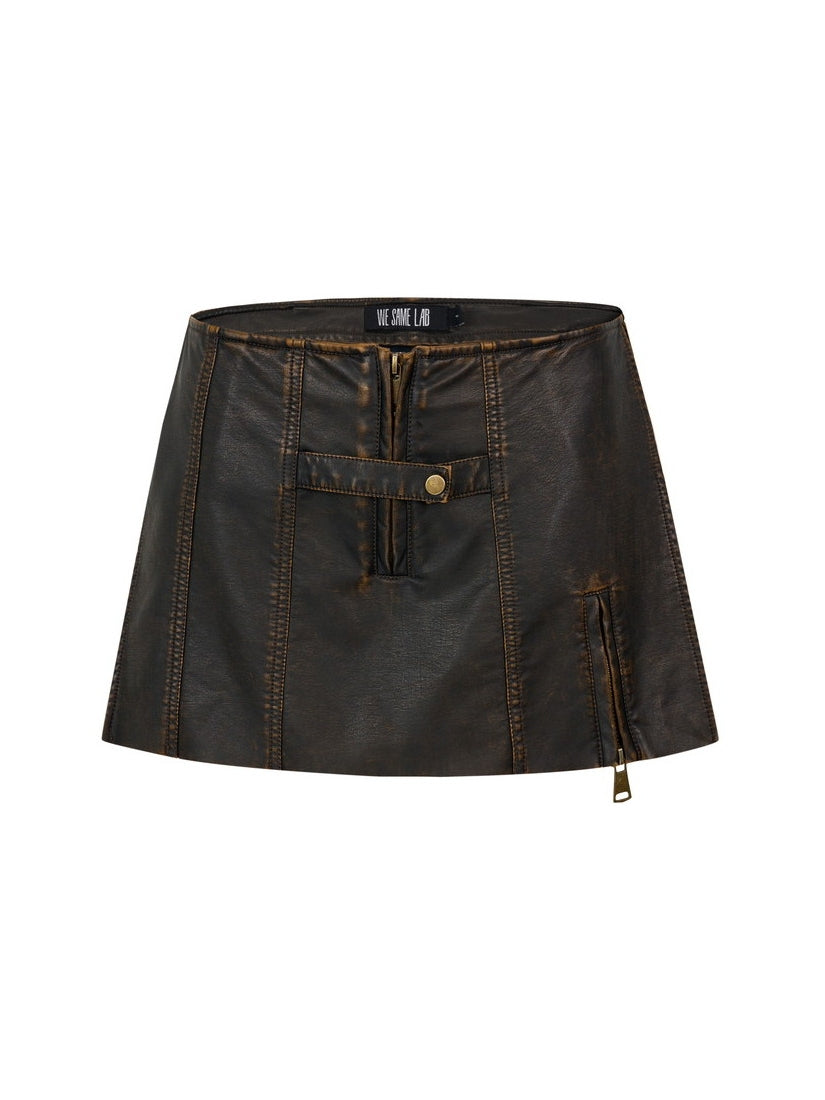 Mini-skirt à glissière vintage serrée en cuir