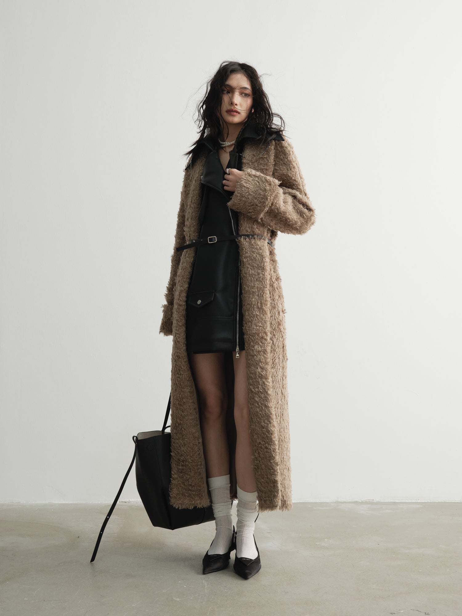 Faux manteau long en cuir PU en deux pièces épissé