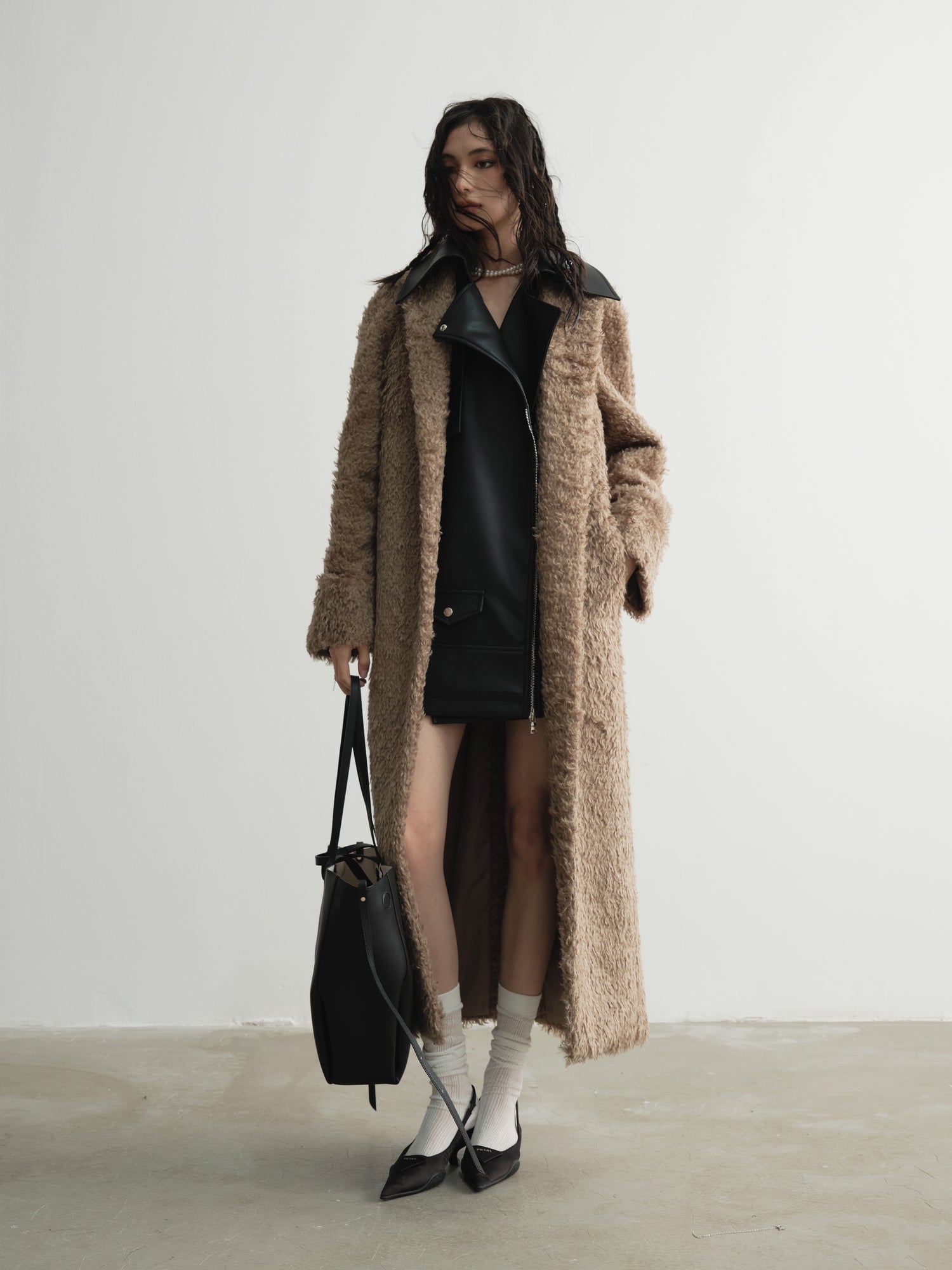 Faux manteau long en cuir PU en deux pièces épissé