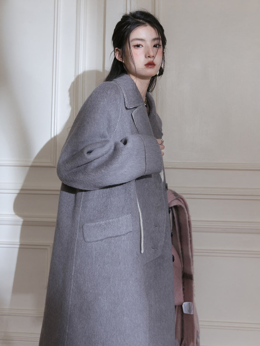 Manteau long en laine à double poitrine