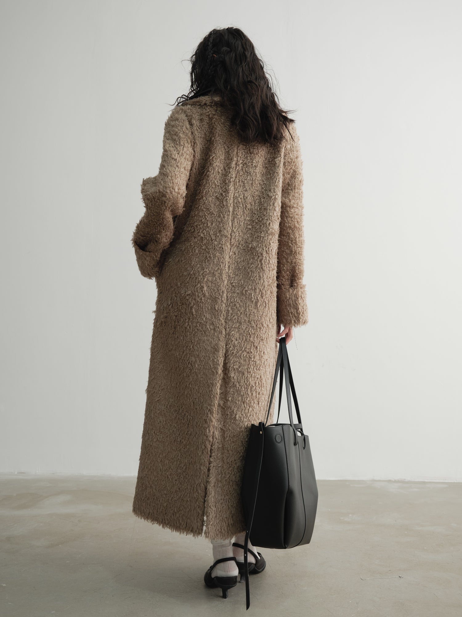 Faux manteau long en cuir PU en deux pièces épissé