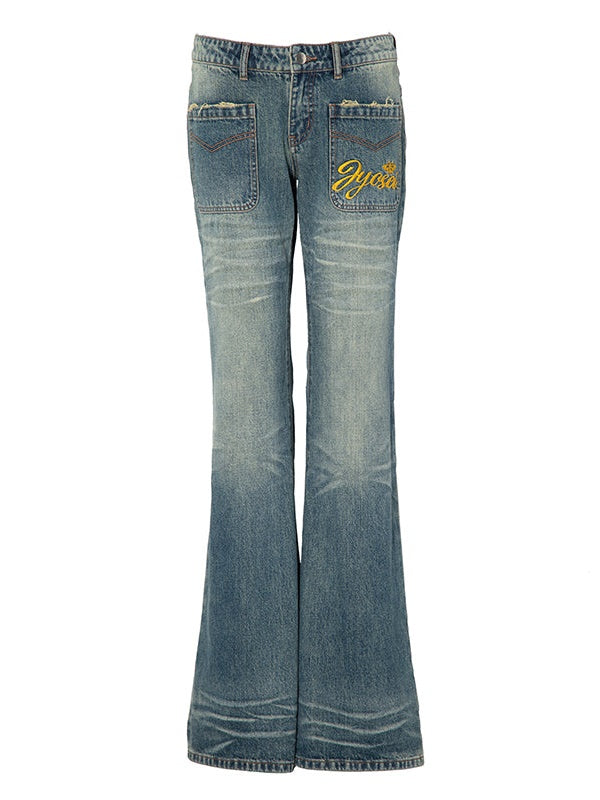 Pantalon denim à lambeaux larges à faible taille