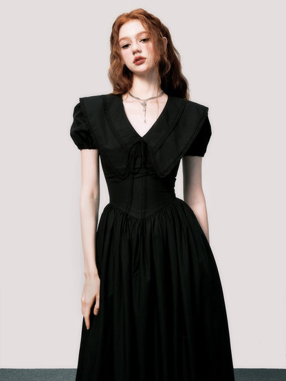 Robe noire à manches bouffantes en V-Neck