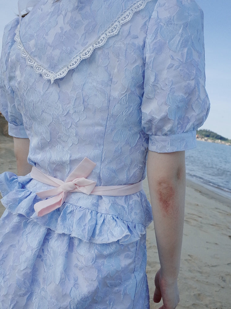 Blouse de peplum à la broderie à manches bouffées à lace