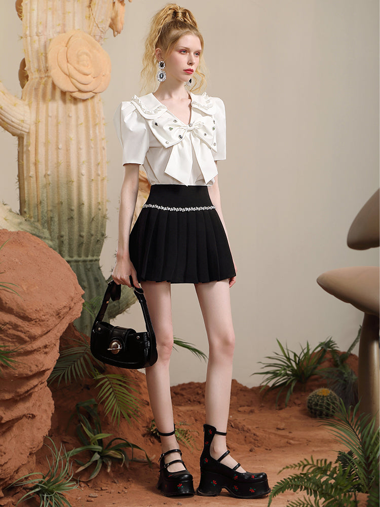 PLEATS BIJOU SHORT PLAIN SKIRT