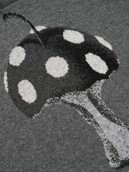 Tricot à coude à polo à champignon pop