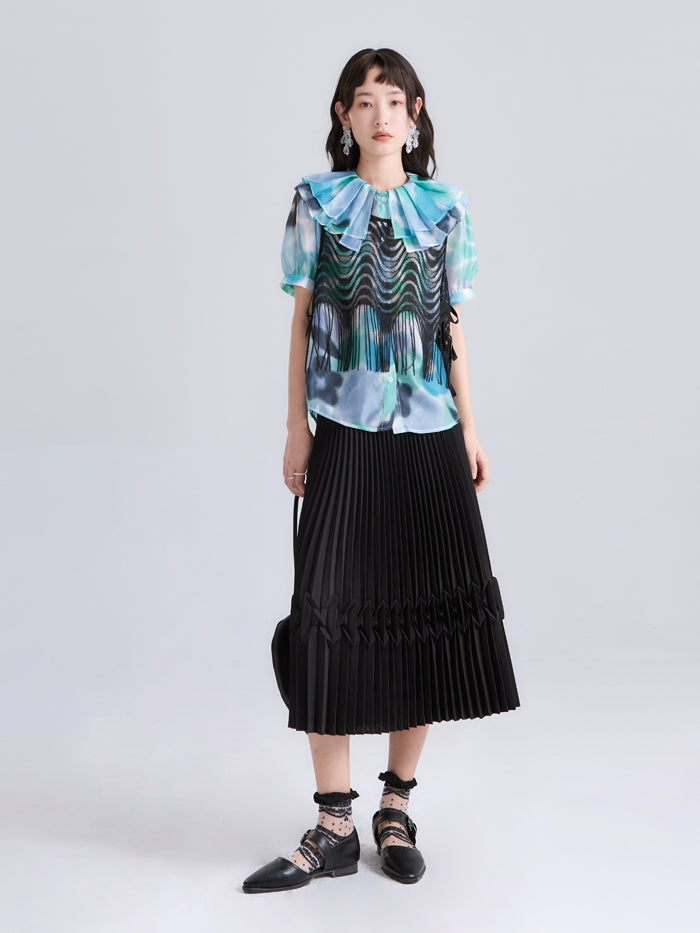 THREE-DIMENSIONAL PLEATED SKIRT