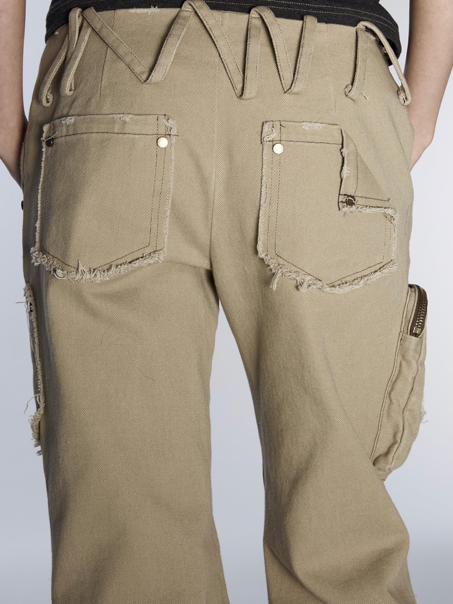 Ultra-low Waist Raw Edge Rivet Denim Flared Pants