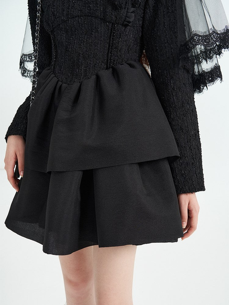 Robe noire tuftée