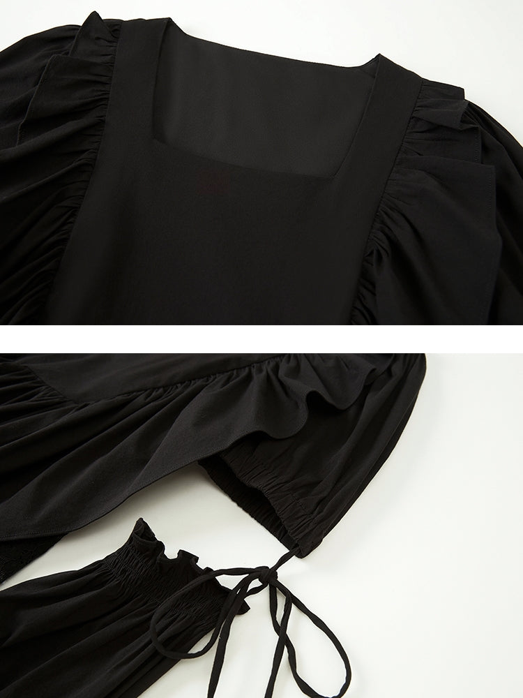 Robe irrégulière noire à manches détachables