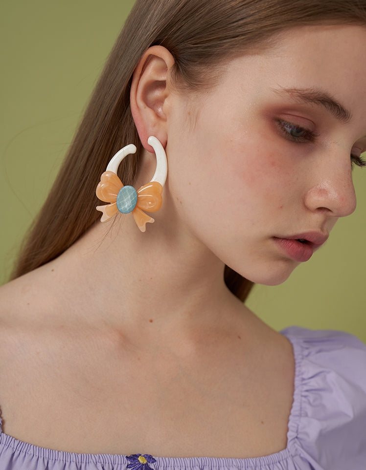 Smudged asymmetric Big Bow Earrings