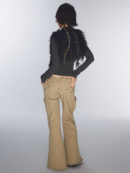 ULTRA-LOW WAIST RAW EDGE RIVET DENIM FLARED PANTS